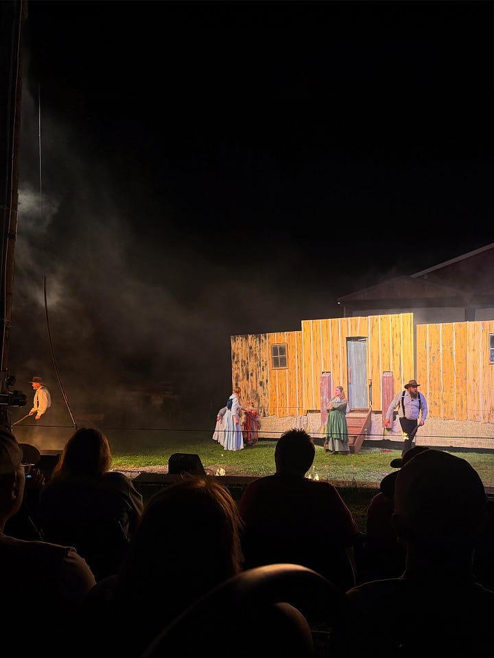 A scene in the play where the Ingalls try to protect their home from a wildfire. | A stunningly star-filled sky.