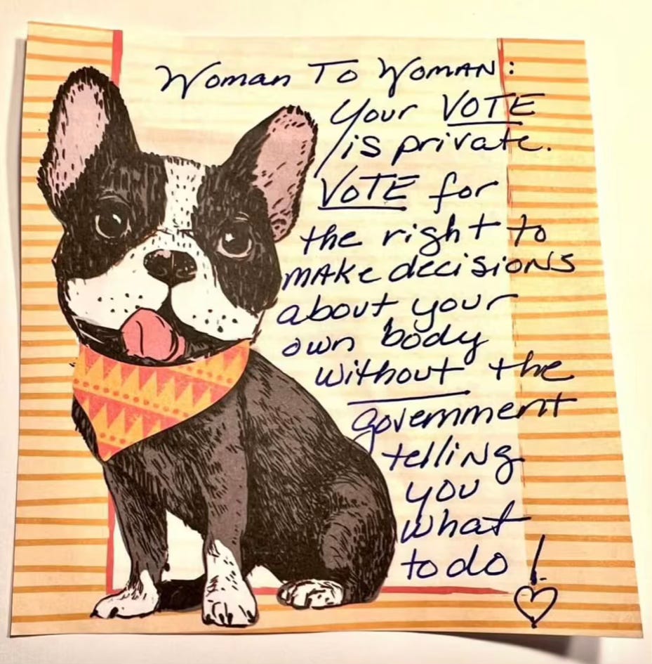 A yellow post-it note with a very cute dog has a message that reads: Woman to woman: Your VOTE is private. VOTE for the right to make decisions about your own body without the government telling you what to do!