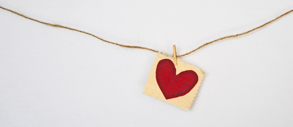 heart-shaped red and beige pendant