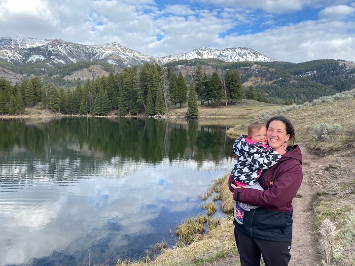 Picture of a bridge in Lisbon, Portugal; Grandma in a yellow dress holding a blanket with Addy; Moose in Grand Tetons National Park and Addy and Lydia at Trout Lake in Yellowstone