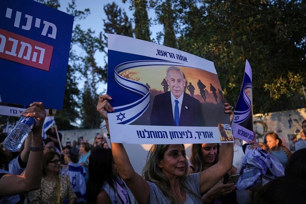Israelis attend a rally supporting Prime Minister Benjamin Netanyahu, outside the Knesset, the Israeli parliament in occupied al-Quds, Thursday, June 5, 2025 (AP) Israelis attend a rally supporting Prime Minister Benjamin Netanyahu, outside the Knesset, the Israeli parliament in occupied al-Quds, Thursday, June 5, 2025 (AP)