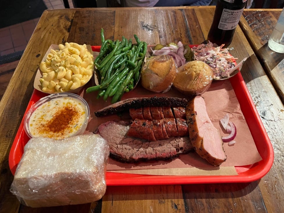 A tray of food on a table

Description automatically generated