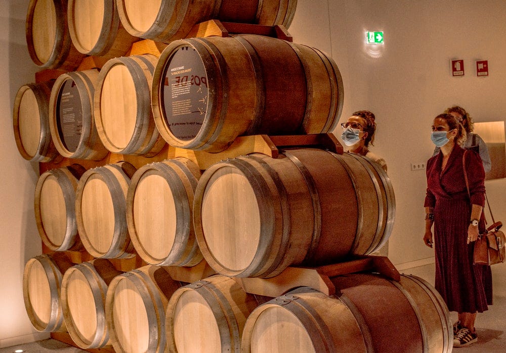 brown wooden barrels on brown wooden barrels