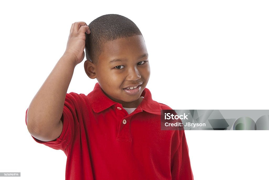 Real People African American Boy Scratching Head Thinking Confused Stock  Photo - Download Image Now