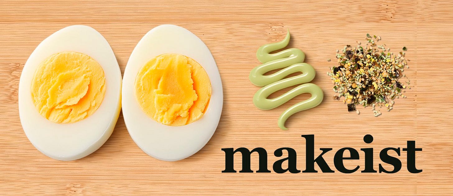 Halved hard-boiled egg topped with mayo and furikake beside the simple three-ingredient recipe. Halved hard-boiled egg topped with mayo and furikake beside the simple three-ingredient recipe.