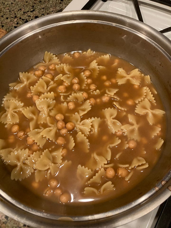 garbanzo and bow ties soup in a pot and a bowl of chickpeas, tomatoes, and noodles