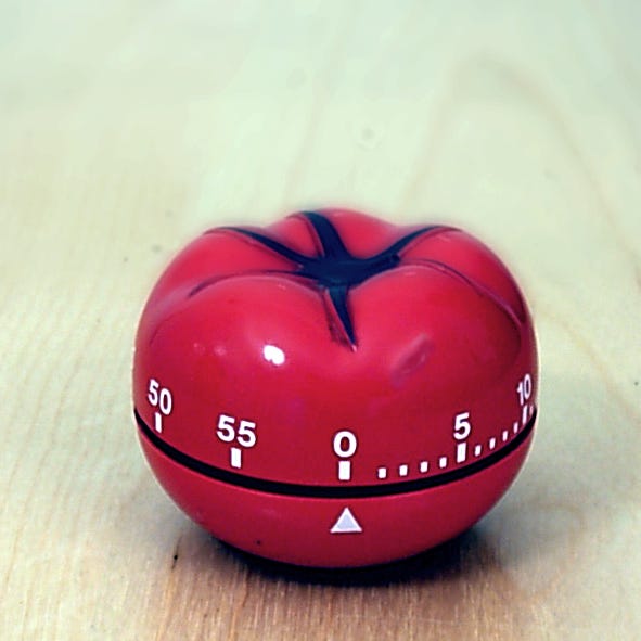 A tomato-shaped Pomodoro kitchen timer A tomato-shaped Pomodoro kitchen timer
