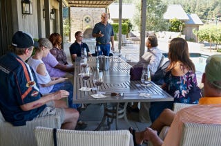 Rob sharing his wines with visitors Rob sharing his wines with visitors