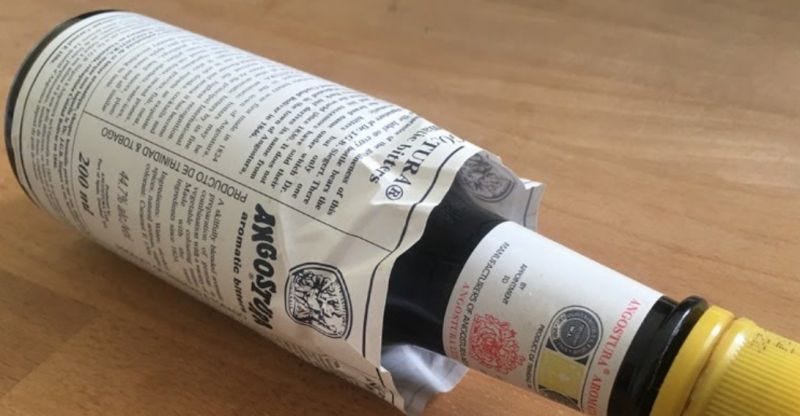 Ever wondered why the Angostura Bitters label doesn't fit? Cool story. When Dr. Johann Siegert died in 1870, his two sons took over the business. One year, as they were about the Ever wondered why the Angostura Bitters label doesn't fit? Cool story. When Dr. Johann Siegert died in 1870, his two sons took over the business. One year, as they were about the