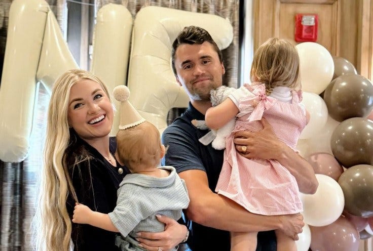 May be an image of 2 people, baby and people smiling
