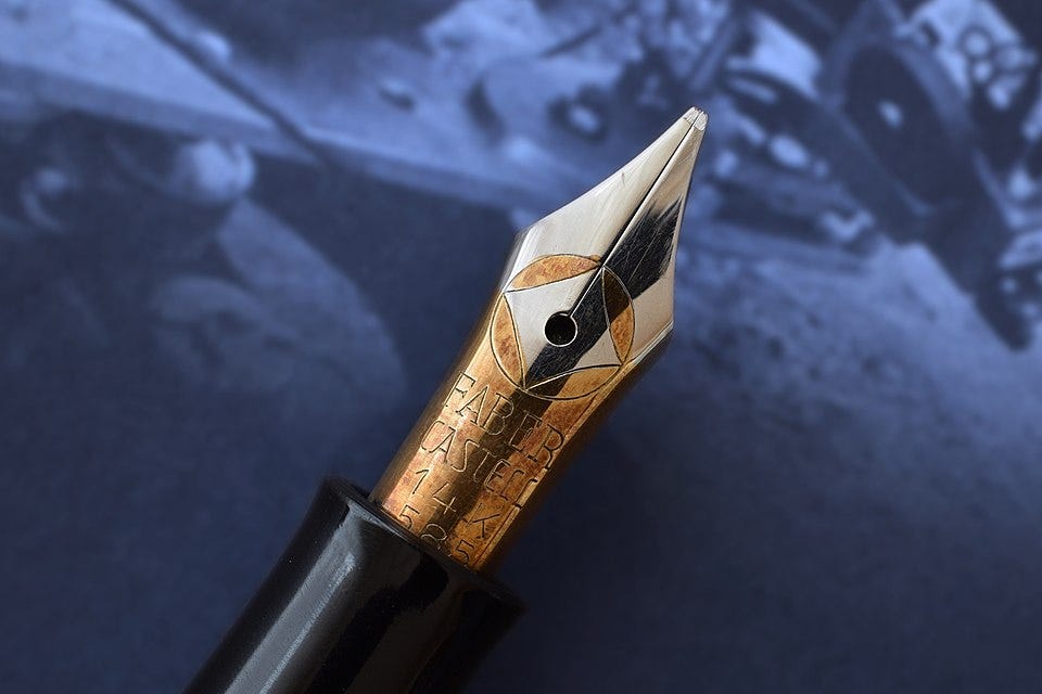 https://upload.wikimedia.org/wikipedia/commons/thumb/a/a8/Two-Tone_Fountain_Pen_Nib-Plum.jpg/960px-Two-Tone_Fountain_Pen_Nib-Plum.jpg