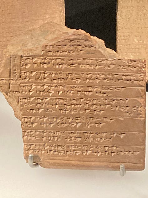 Various texts on scrolls or carved into stones plus the Library at Celcus