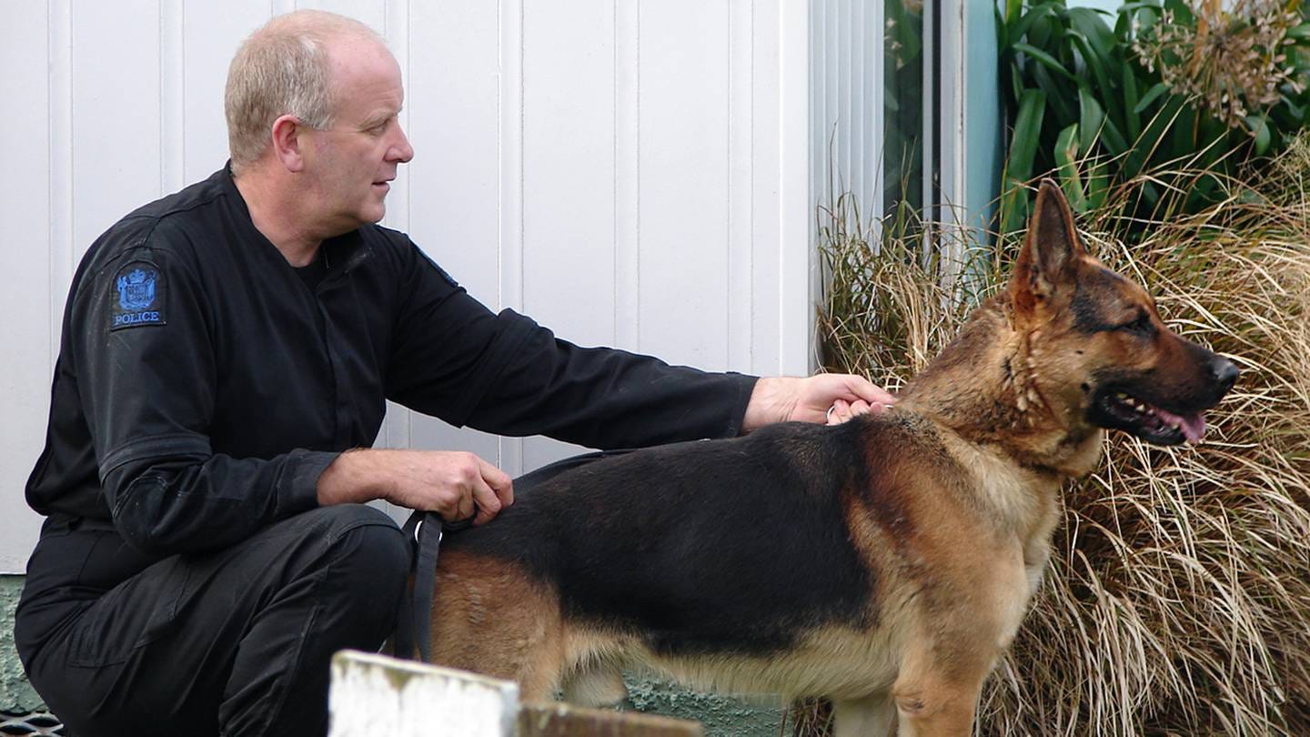 Police dog Gage and his handler Senior Constable Bruce Lamb, who died yesterday. Photo / Supplied Police dog Gage and his handler Senior Constable Bruce Lamb, who died yesterday. Photo / Supplied