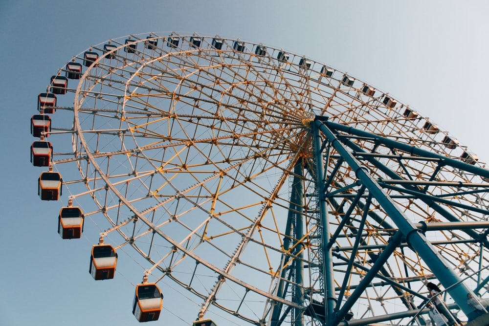 white and blue ferris wheel white and blue ferris wheel