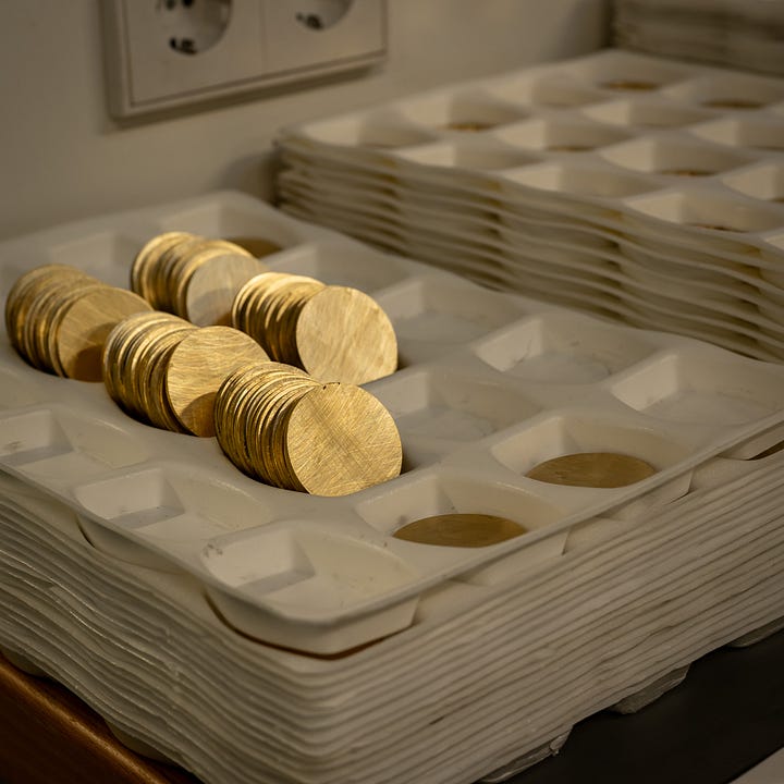 Nomos glashutte manufacturing brass base plates