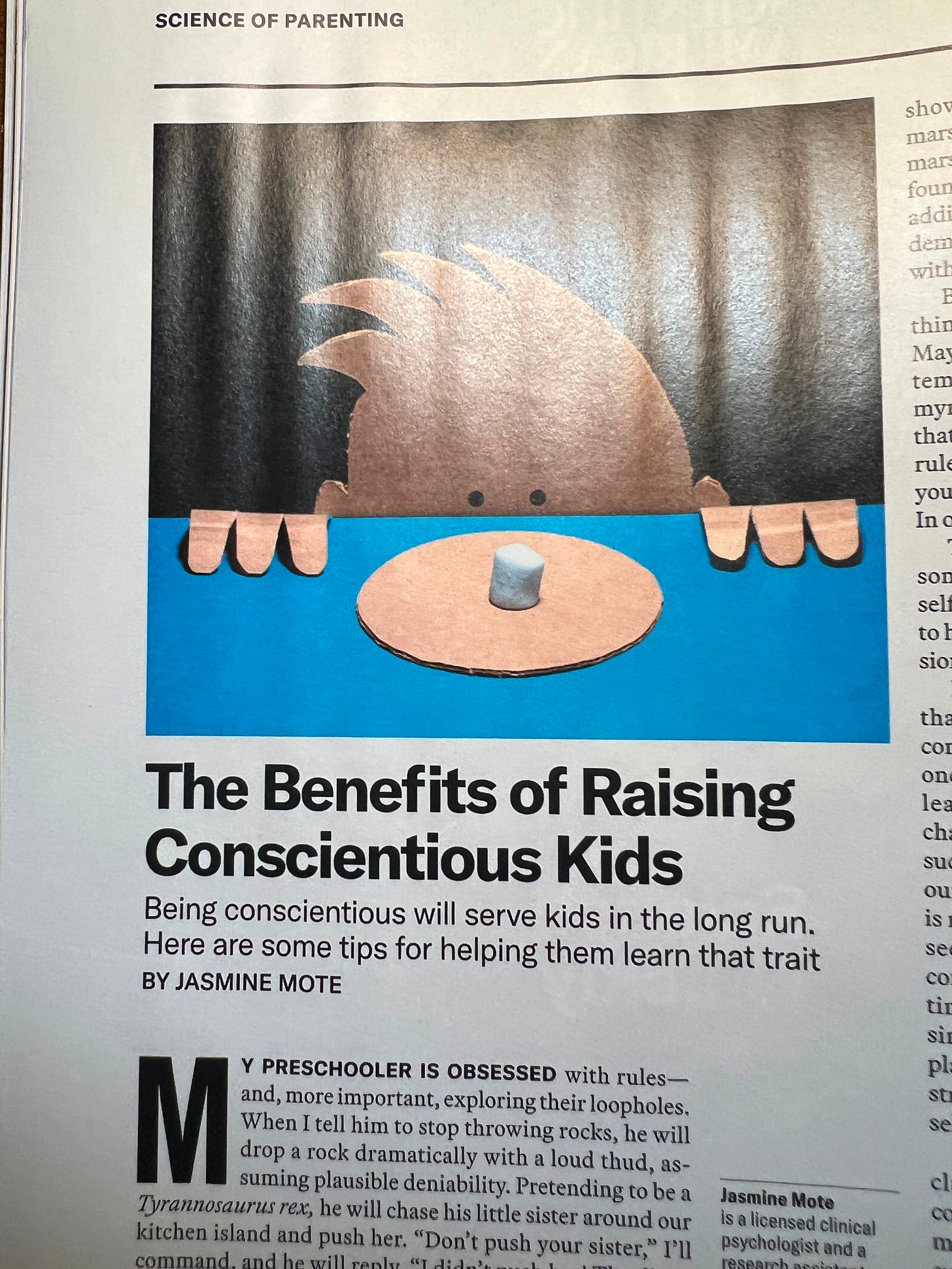 Photograph of part of a magazine article with an image of cartoon kid looking at a marshmallow alongside text