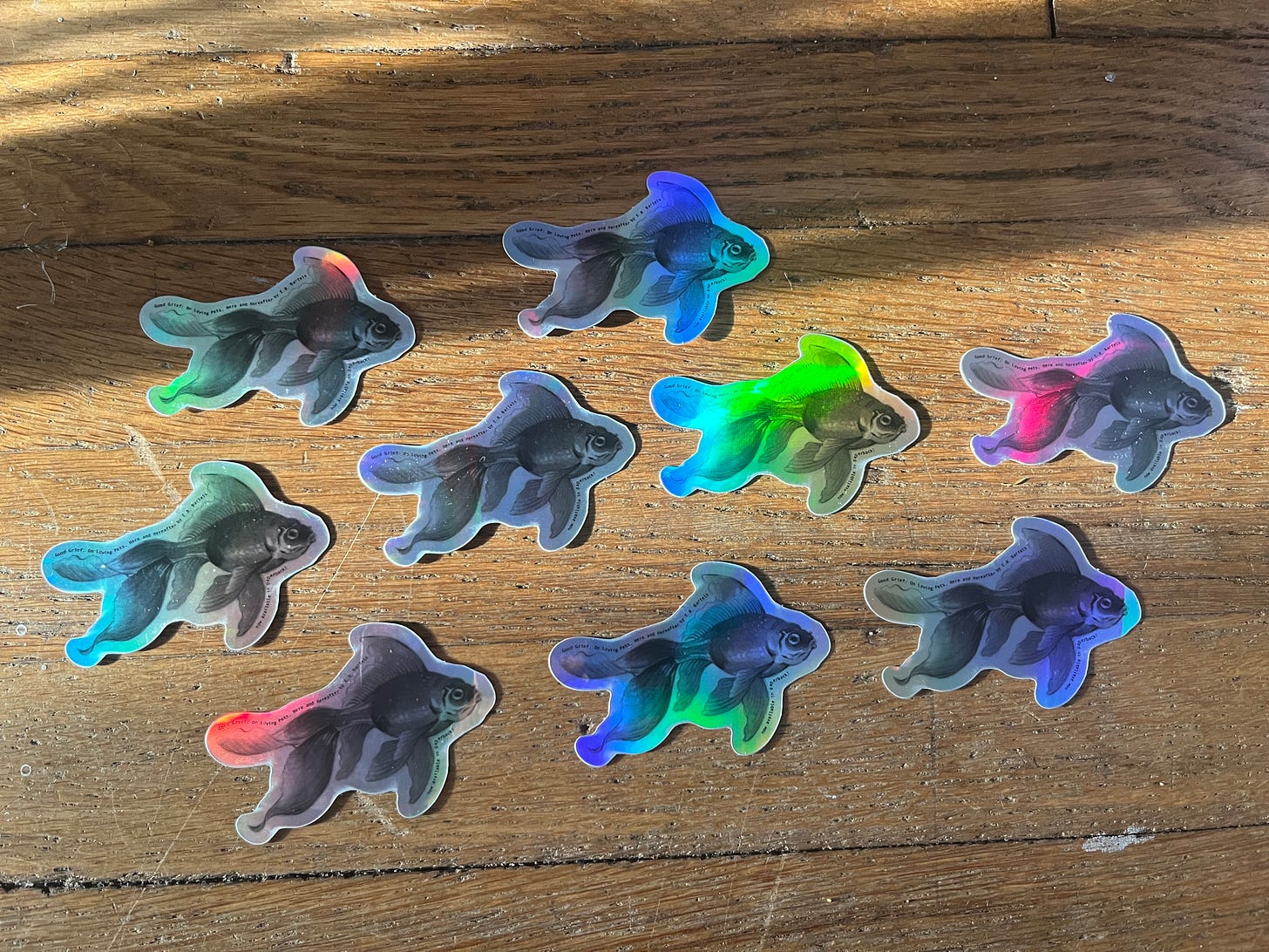 A school of holographic fish stickers!