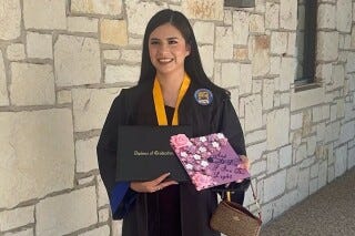 In this undated photo provided by her attorney, Todd Pomerleau, Any Lucia Lopez Belloza celebrates her high school graduation in Texas. (Any Lucia Lopez Belloza's attorney via AP)