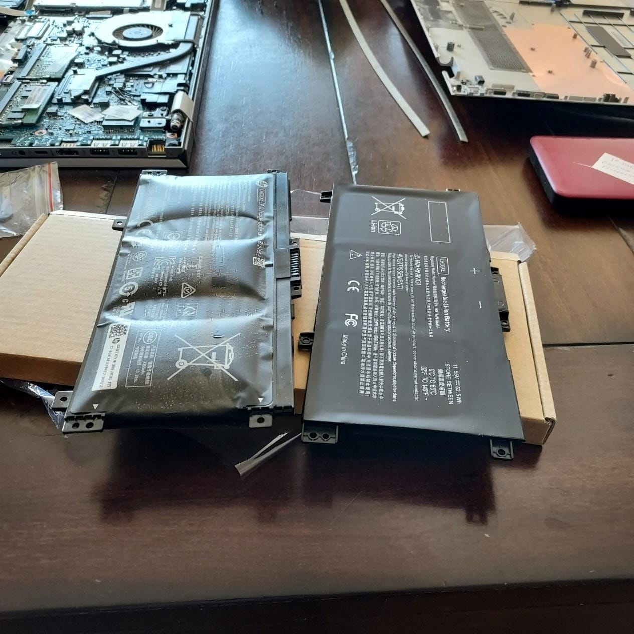 A group of batteries on a table
AI-generated content may be incorrect.