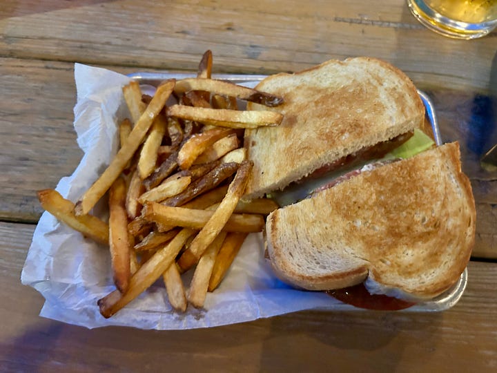 BLT, beer, cornhole, umbrellas, picnic tables