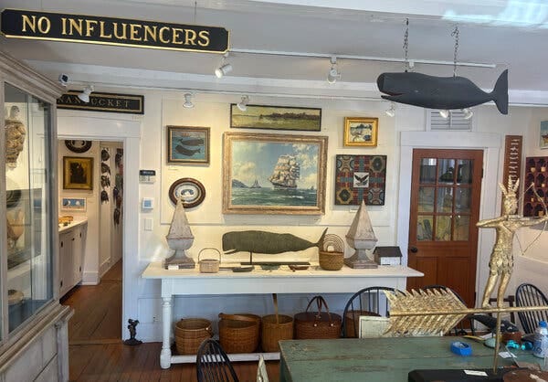 The interior of a shop with nautical antiques and housewares.
