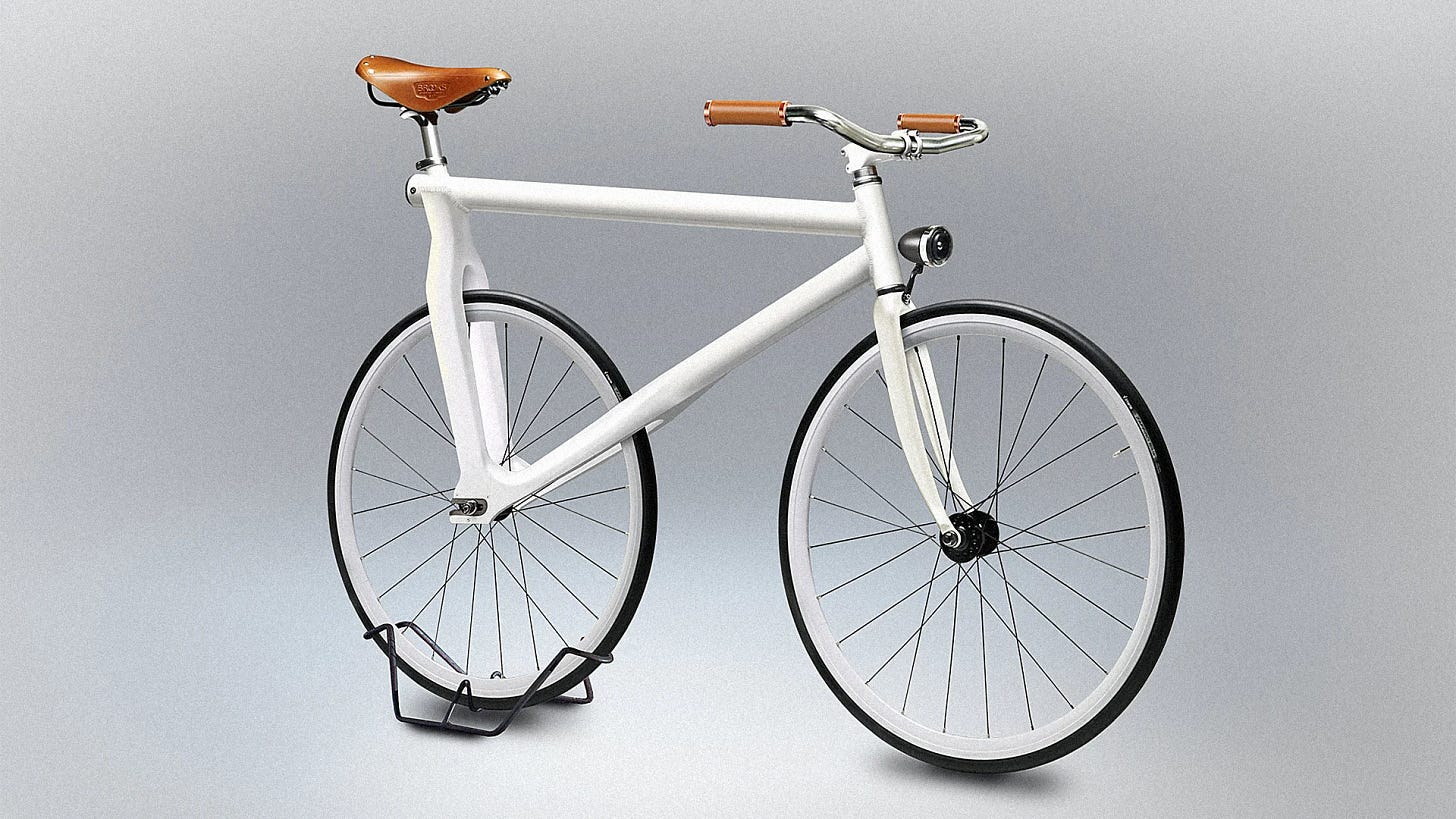 A bike with no pedals or chain, and an impossible frame