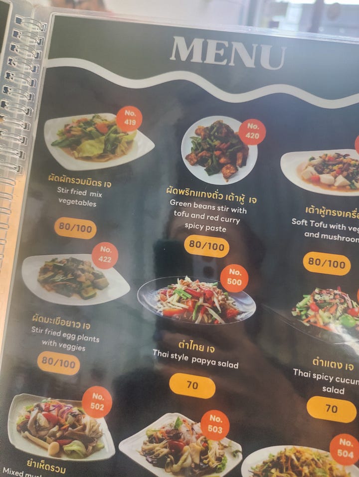 plate of food + menu page at eat me veggie + vegan