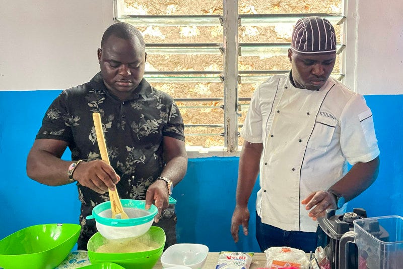 Frank Thoya, founder of Samaki Biscuits (left) and Ngumbao Kazungu, pastry chef (right), preparing ingredients for making fish cookies. Photo: Velma Pamela, bird story agency