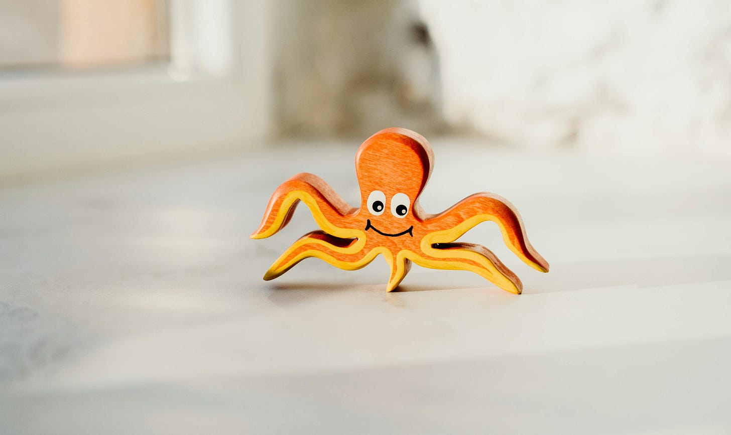 Photo by cottonbro studio: https://www.pexels.com/photo/shallow-focus-photo-of-wooden-octopus-toy-3663079/