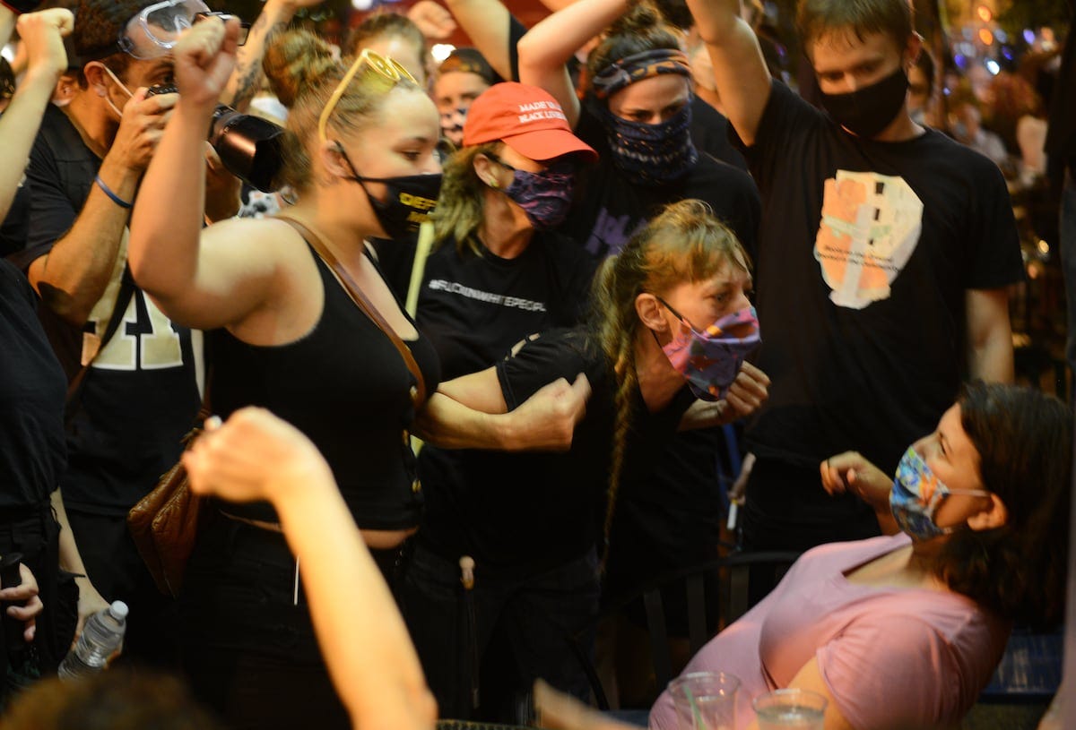 Black Lives Matter protesters confront White diners demanding show of  support — but a woman refused - The Washington Post