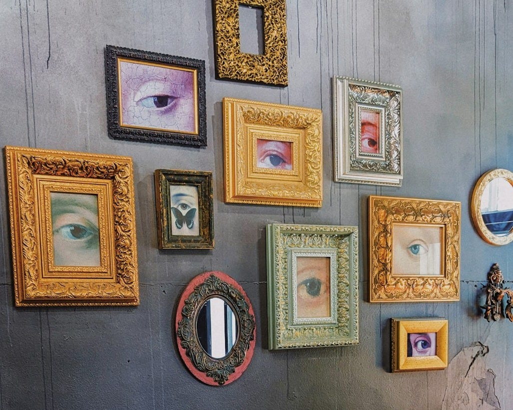 a wall with pictures on it