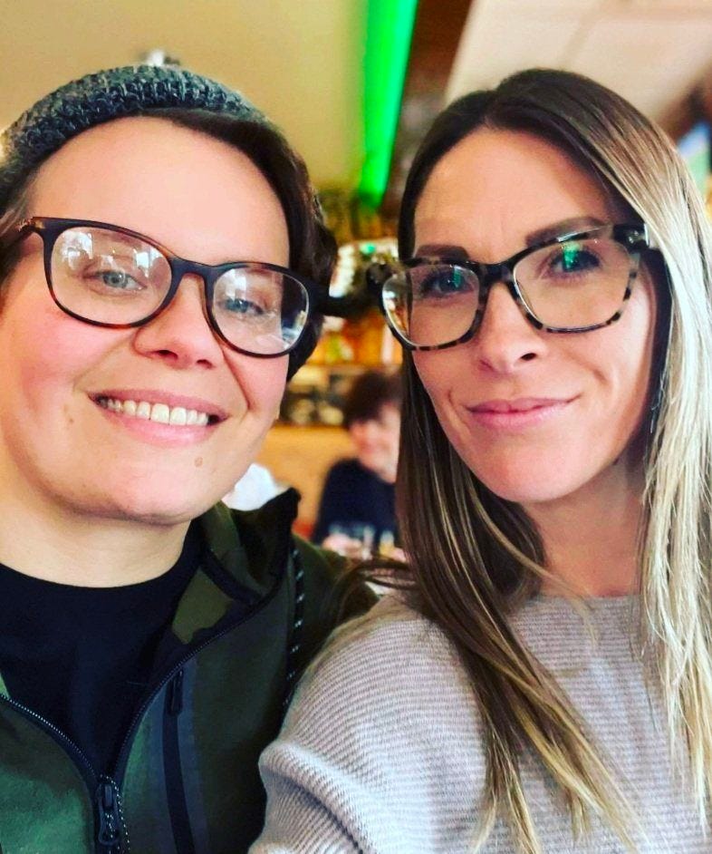 May be an image of 2 people, eyeglasses and indoor