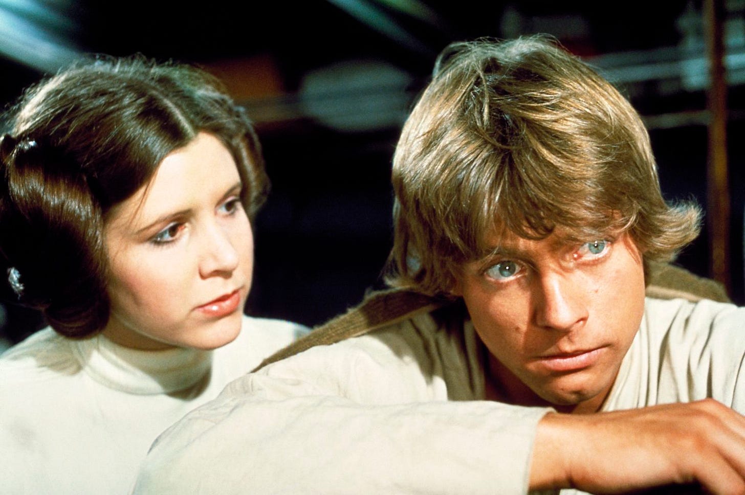 Princess Leia comforts Luke Skywalker after the death of Obi Wan Kenobi