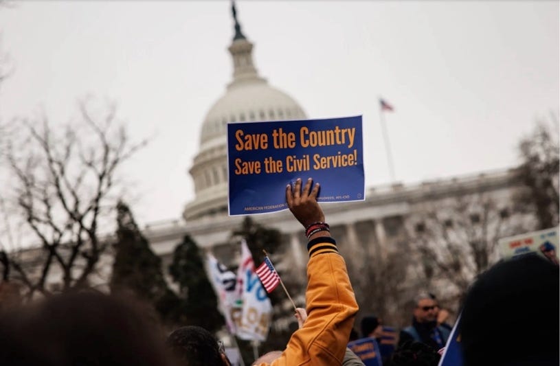 A person holding a sign in front of a white house
AI-generated content may be incorrect. A person holding a sign in front of a white house
AI-generated content may be incorrect.
