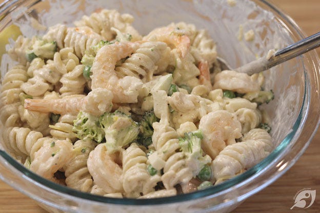 Toss lightly, then gently fold in the shrimp or other protein you’ve chosen. Toss lightly, then gently fold in the shrimp or other protein you’ve chosen.