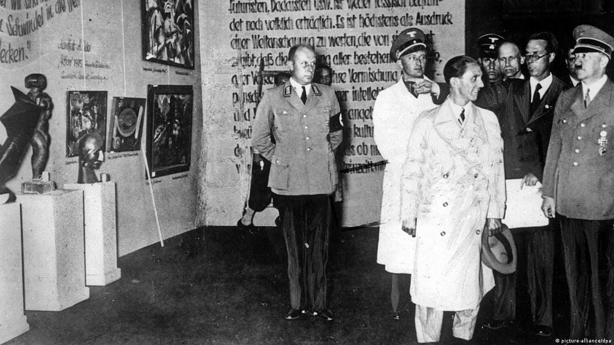 Hitler and Joseph Goebbels touring the 1937 “Degenerate Art” exhibition in Munich. The exhibition showcased works confiscated from German museums as part of the Nazi campaign against modernism, avant-garde culture, and what the regime described as “degenerate” artistic influence.
