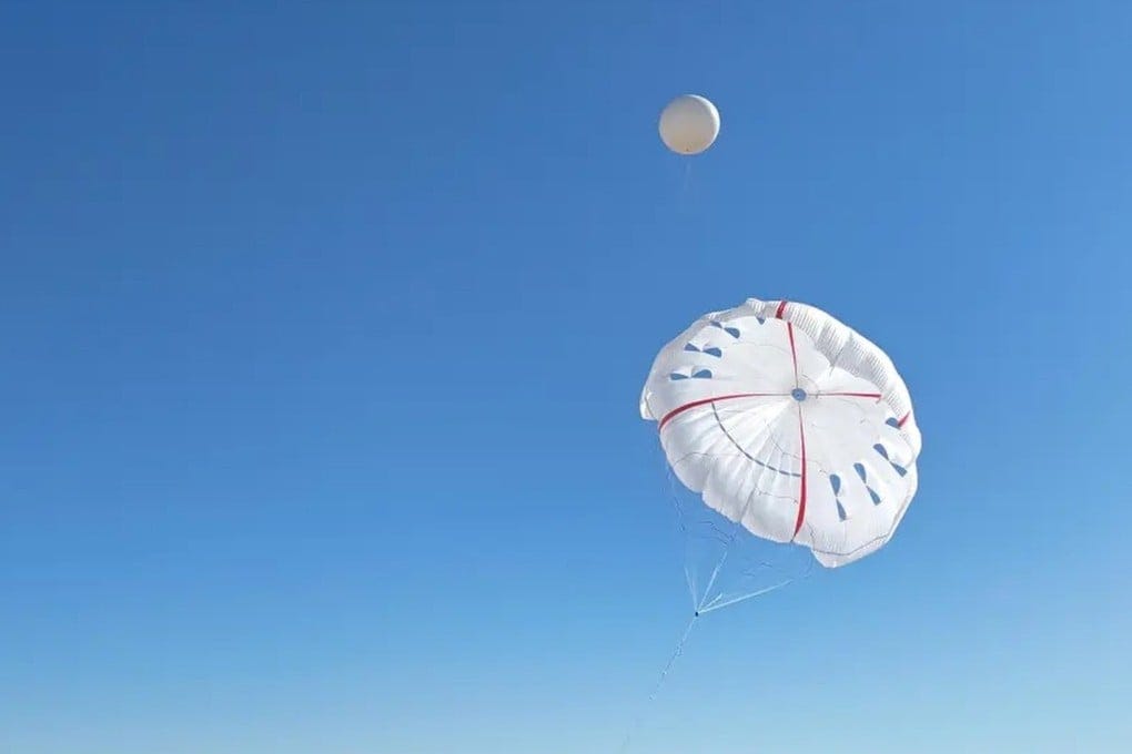 During the tests, the 5,000 square-metre kite and two connected 1,200 square-metre kites were lifted into the air by helium balloon. Photo: CCTV