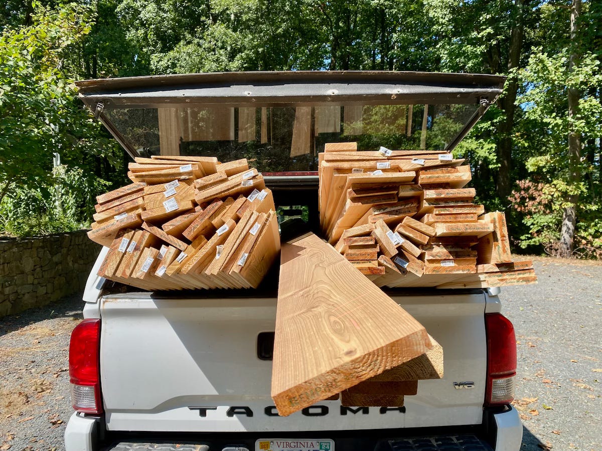 Pick-up truck filled with cedar lumber Pick-up truck filled with cedar lumber