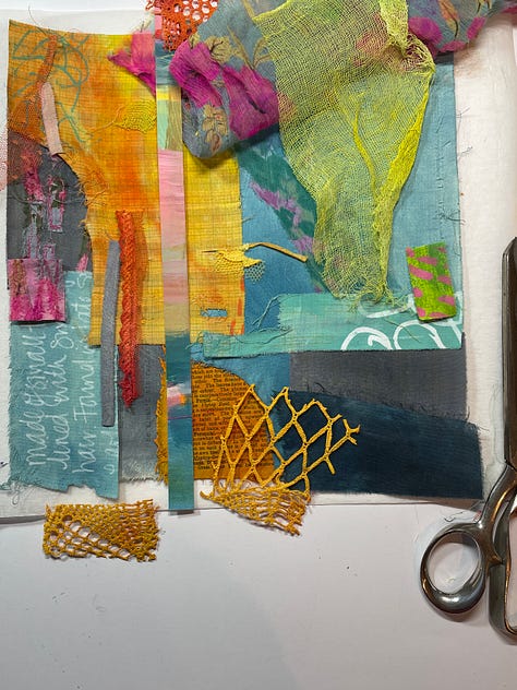 colourful fabric and fabric scraps with bundles of threads on top