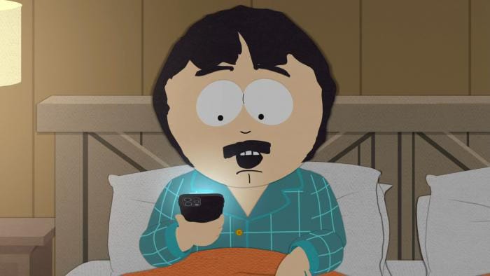 Randy from South Park conversing with ChatGPT in bed