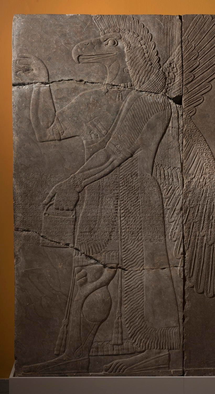 An eagle-headed apkallu with cone and bucket, from Ashurnasirpal II's palace at Nimrud, ca. 883 to 859 BC. An eagle-headed apkallu with cone and bucket, from Ashurnasirpal II's palace at Nimrud, ca. 883 to 859 BC.
