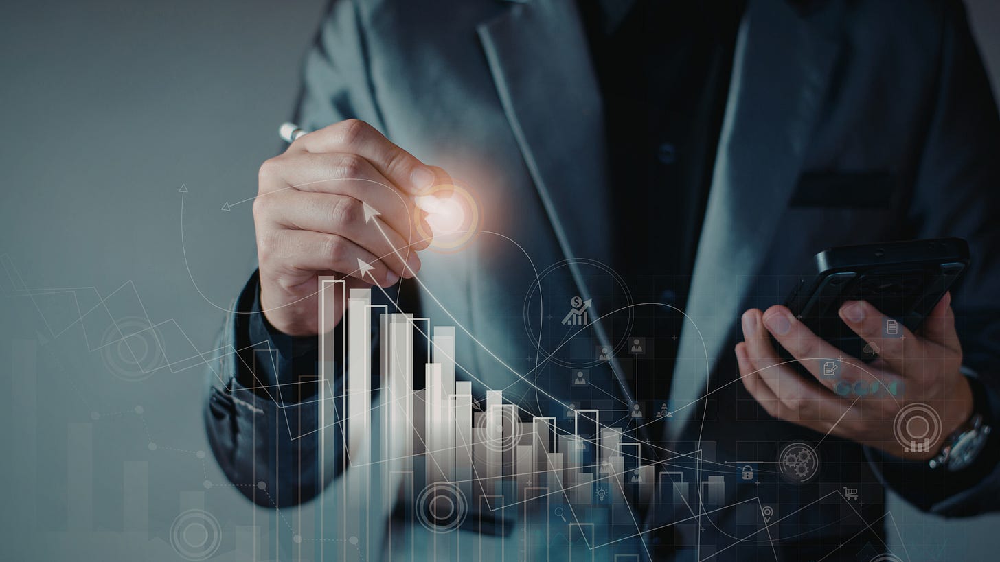 Illustrated photo of a person holding a stylus that appears to be glowing. There are charts and various lines superimposed on the person Illustrated photo of a person holding a stylus that appears to be glowing. There are charts and various lines superimposed on the person