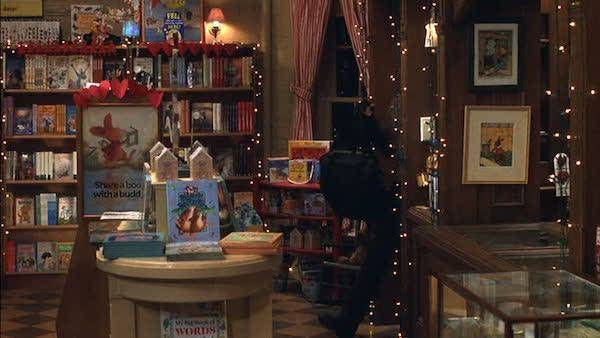 This may contain: a room filled with lots of books and toys
