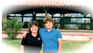 Vision quest staff and beth in a turquoise shirt