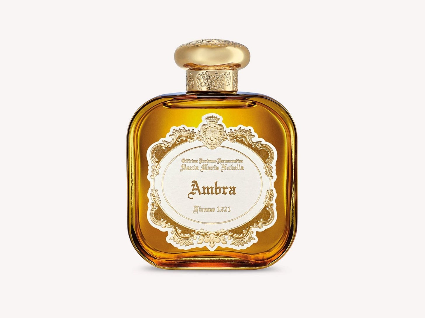 frasco de um perfume italiano chamado Ambra, com detalhes em dourado e o vidro da cor âmbar.