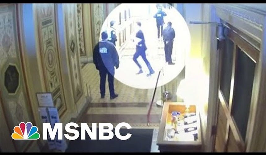 Screenshot of January 6 Capitol security video showing Josh Hawley fleeing the mob he had earlier given a raised-fist gesture of support. Hawley is highlighted in the freeze frame by a digital 'spotlight' effect. In one corner is the NBC peacock and MSNBC logo. Screenshot of January 6 Capitol security video showing Josh Hawley fleeing the mob he had earlier given a raised-fist gesture of support. Hawley is highlighted in the freeze frame by a digital 'spotlight' effect. In one corner is the NBC peacock and MSNBC logo.