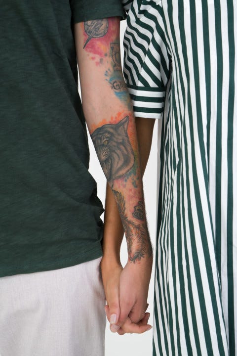 Two people in an ADHD relationship, holding hands.