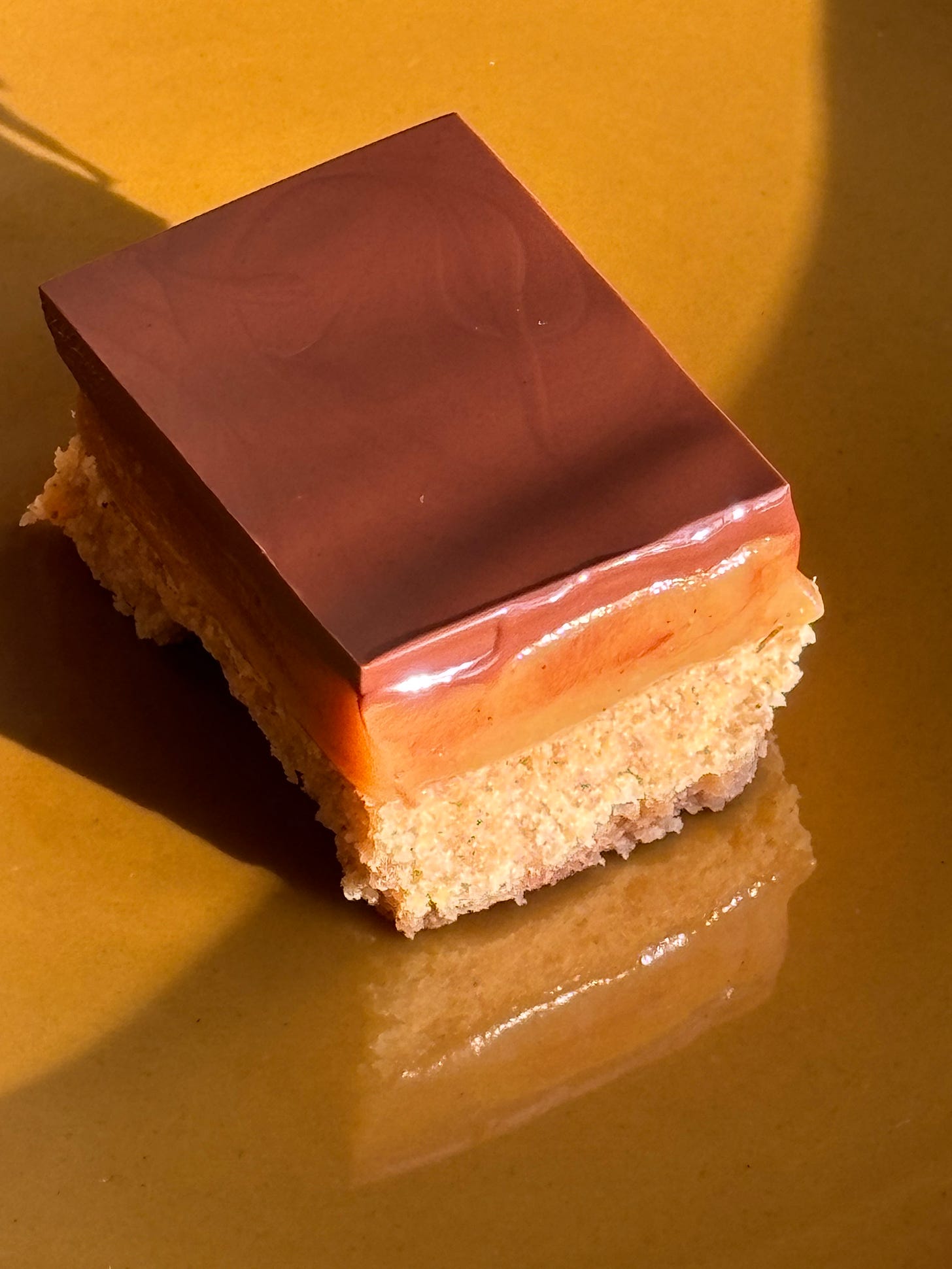 a slice of millionaire's shortbread a slice of millionaire's shortbread
