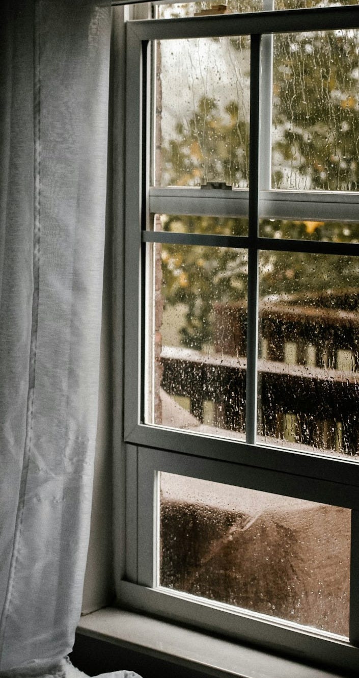 water dew on clear glass sliding window during daytime