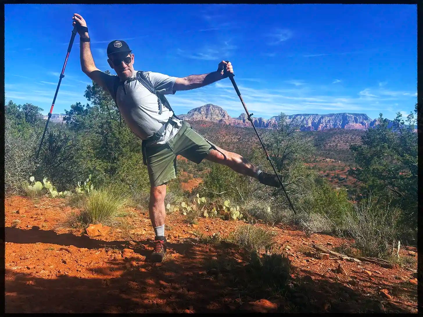 A hiker showing off an influencer pose.